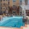 a swimming pool in a courtyard